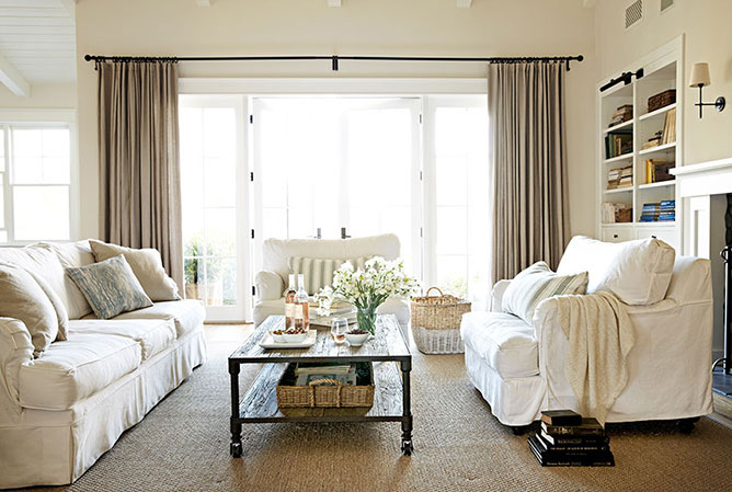 Hang draperies high to make windows look larger